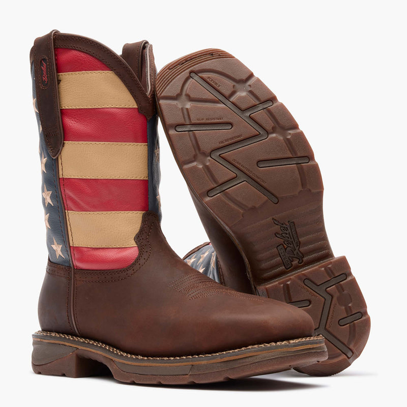 Front view of a pair of Durango Workin' Rebel work boots with American flag shaft design with outsole showing