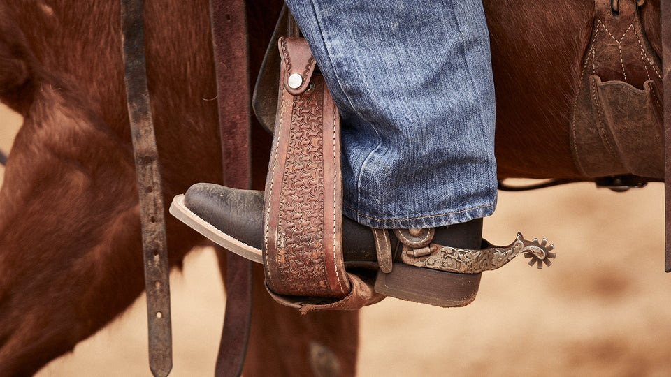 Closeup of a Durango boot in a stirrup
