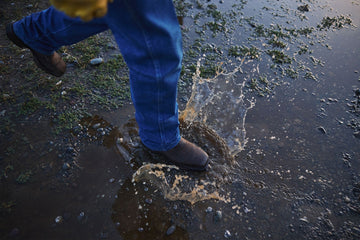 Waterproof Durango western boots stepping into water