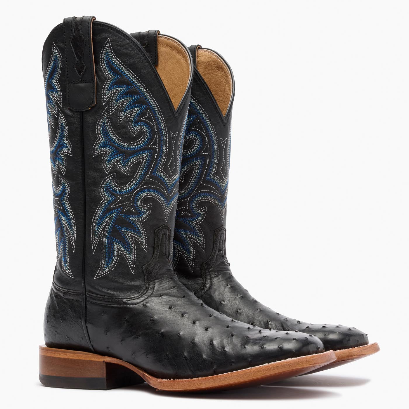 Front view of a pair of Durango Premium Exotic black square toe Ostrich western boots