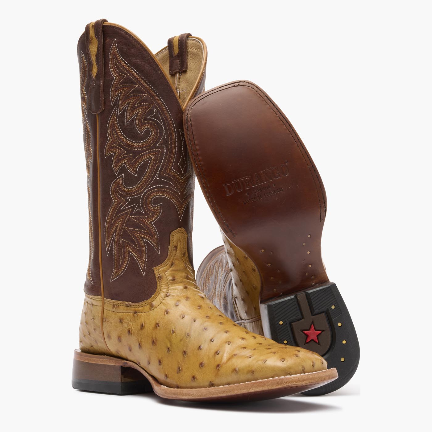 Front view of Durango Premium Exotic brown square toe Ostrich western boot showing leather outsole