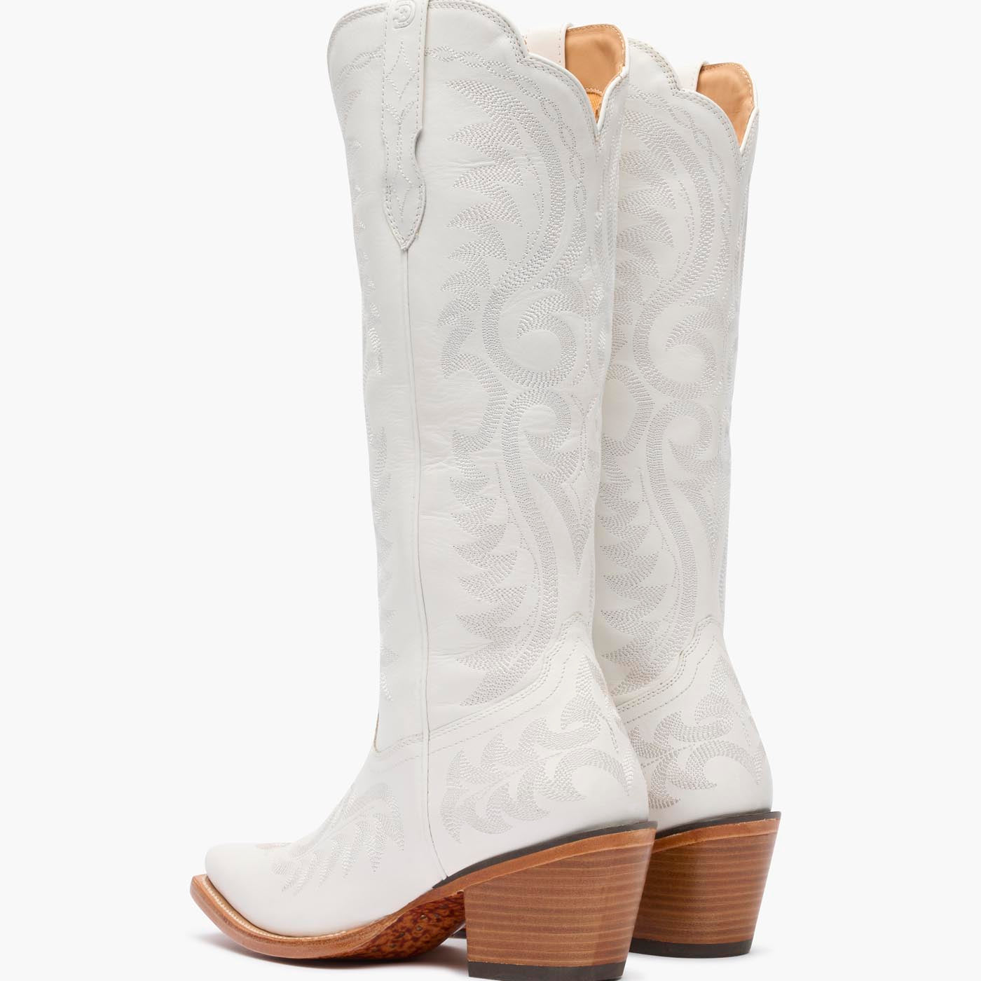 Back pair view of Durango white cowgirl boots with white stitching.