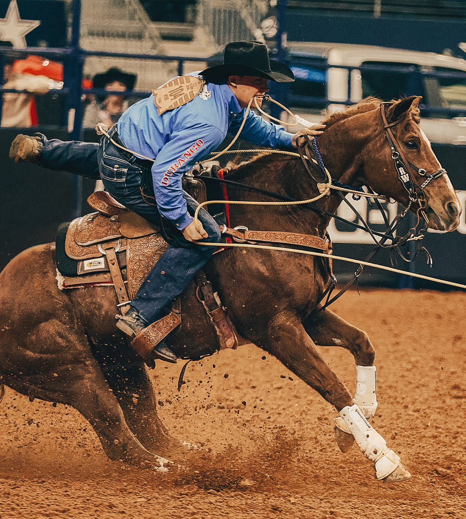 Riley Webb Tie-Down roping in Durango boots PRCA Collection